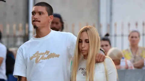 EPA / Shutterstock Liverpool player Darwin Nunez attends the public wake in Gondomar on Friday alongside his girlfriend Lorena Manas