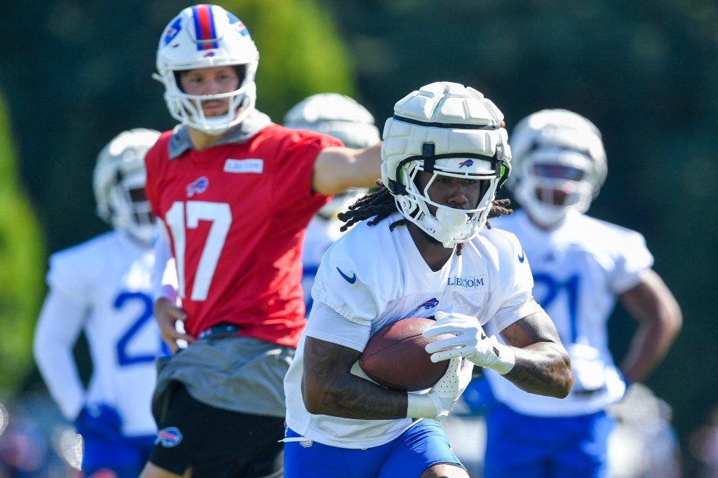 Buffalo Bills running back James Cook (4) on the field during training camp at St. John Fisher University.